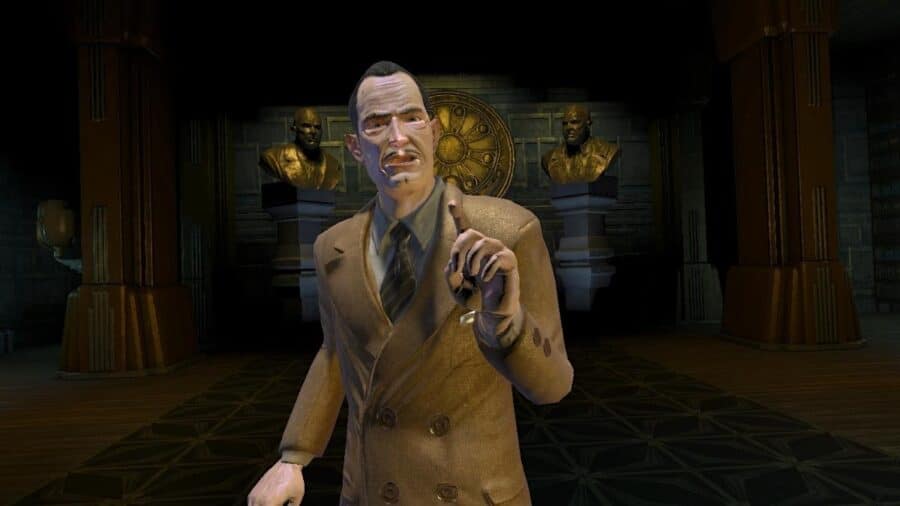 Andrew Ryan in abito elegante indica il giocatore all’interno di una sala monumentale di BioShock, con busti e decorazioni sullo sfondo.