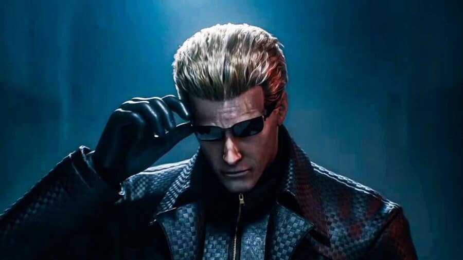 Albert Wesker indossa occhiali scuri e guanti neri mentre abbassa leggermente gli occhiali in un ritratto promozionale di Resident Evil.