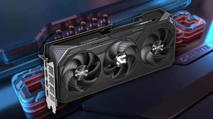 Scheda video Gigabyte Radeon RX 9060 XT con tripla ventola, mostrata su sfondo futuristico con illuminazione blu e rossa.