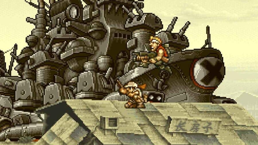 Schermata di Metal Slug con due personaggi armati davanti a un enorme mezzo corazzato, realizzata in pixel art dettagliata.