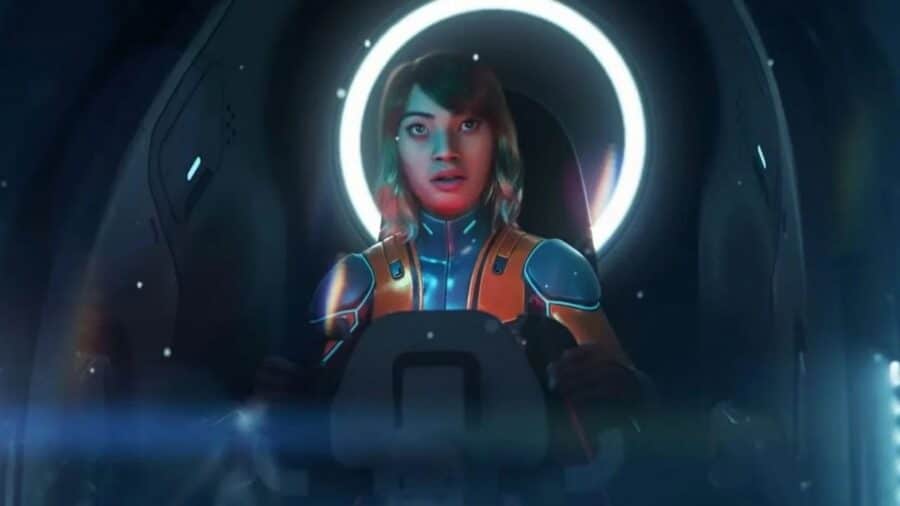 Giovane protagonista all’interno di una capsula o veicolo futuristico, illuminata da un anello luminoso alle spalle in un ambiente sci-fi bluastro.