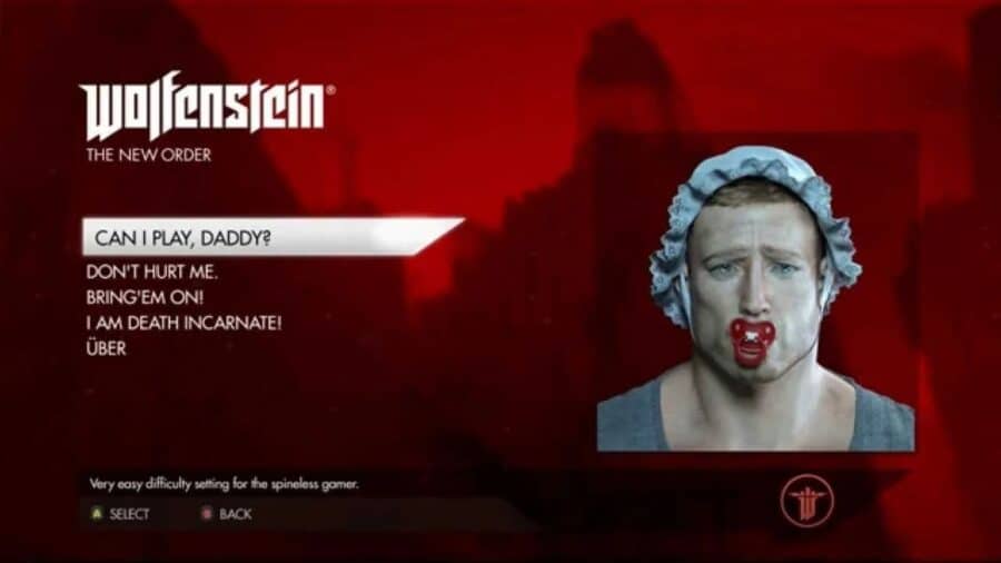 Schermata di selezione della difficoltà di Wolfenstein: The New Order con l’opzione più facile evidenziata e un volto maschile raffigurato in modo caricaturale con cuffietta e ciuccio.