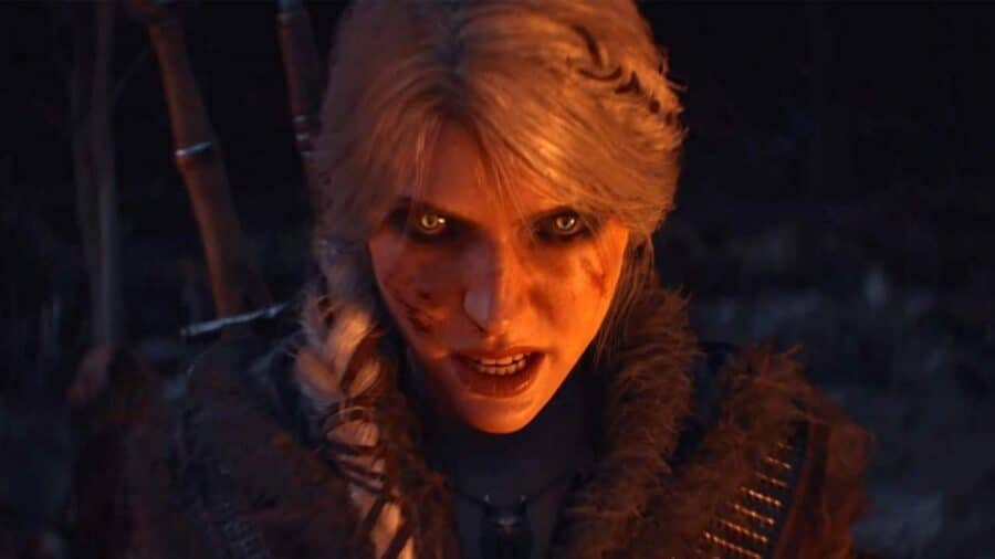Ciri in The Witcher 4 con occhi da witcher e volto segnato, illuminata da una luce calda durante una scena intensa e drammatica.