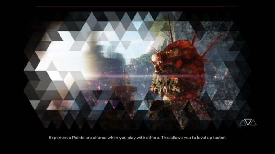 Schermata di caricamento di un videogioco con grafica fantascientifica frammentata da un effetto a mosaico, accompagnata in basso dal classico testo con i consigli strategici per il giocatore.