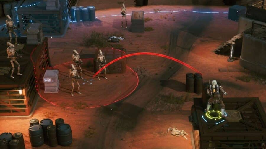 Visuale isometrica tattica di Star Wars Zero Company con un mercenario su un container sopraelevato che prende la mira con una traiettoria rossa curva verso un gruppo di droidi da battaglia B1.