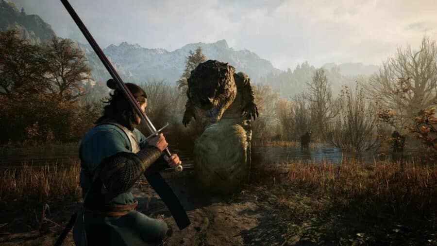 Coen impugna una spada lunga a due mani pronto ad affrontare una gigantesca creatura anfibia mostruosa tra i canneti di una palude montana.