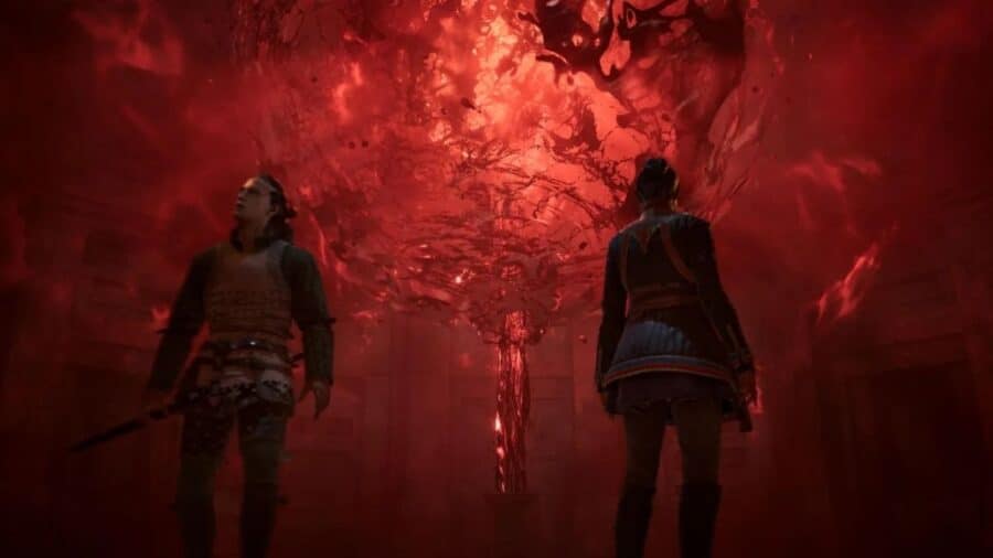 Coen e un'alleata visti di spalle mentre contemplano una sfera vorticante di sangue e magia oscura che pulsa al centro di un'antica sala sotterranea in pietra.