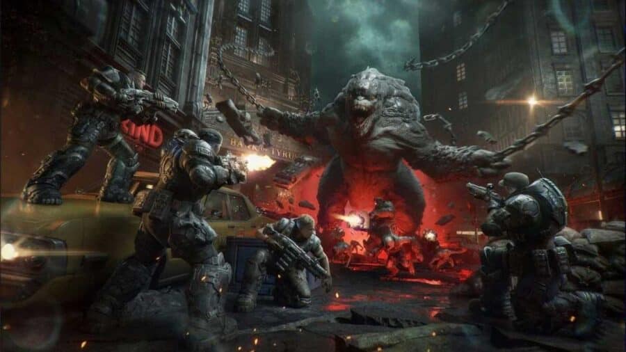 Una squadra di Gears apre il fuoco per strada contro un enorme Berserker infuriato e incatenato davanti all'insegna di un edificio, tra barricate e detriti in fiamme.